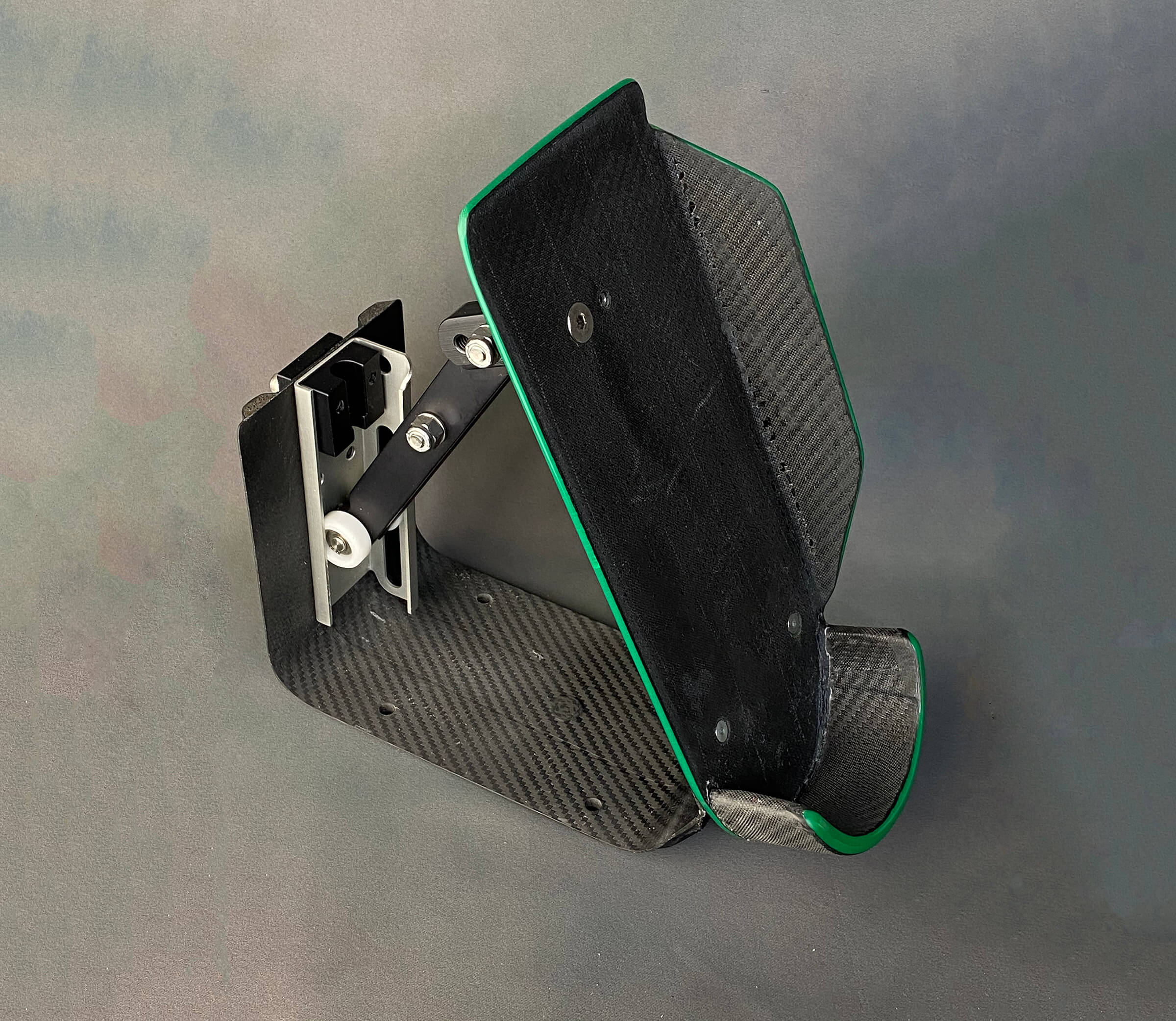 Composite hinge used in a foot pedal on a boat